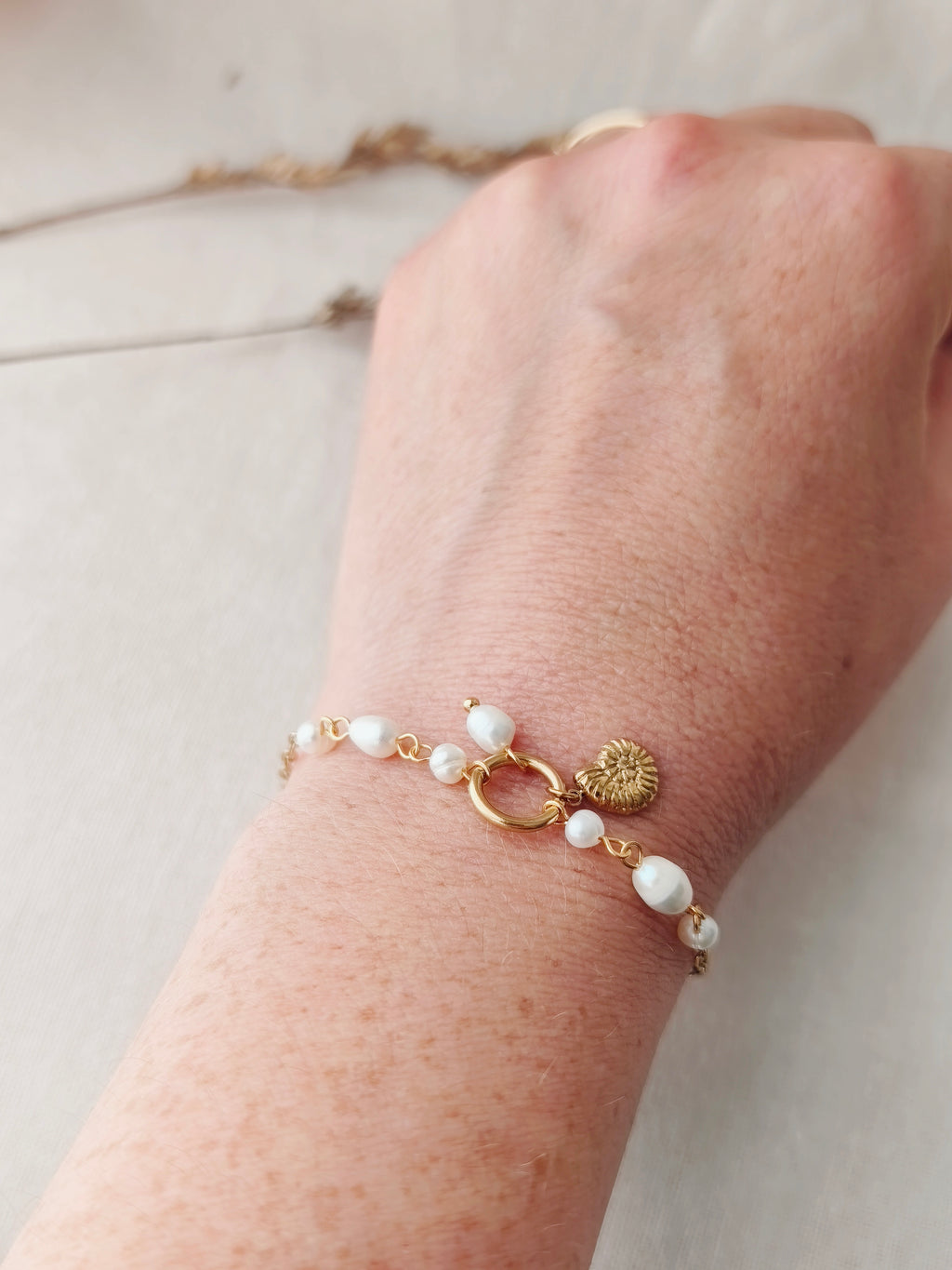 Bracelet perles et coquillage